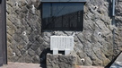 妙龍寺入り口の案内板と菅江真澄石碑