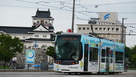 丸の内交差点からの模擬天守と市電…