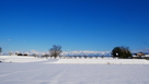 雪の城址と立山連峰…