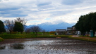 南側水堀と雪の剣岳…