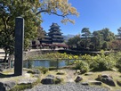 松本城碑と北西から見た天守…