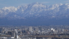白鳥広場展望台からの富山城天守と剣岳…