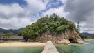 城址遠景（防潮堤より）…