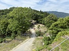 苗木城・菱櫓門跡付近から三の丸跡を見下ろ…