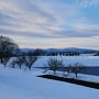 北からの雪の本丸土塁と水堀