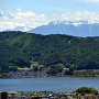 桜城跡から望む木曽山脈と諏訪湖