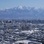 しらとり広場からの雪の富山市街地